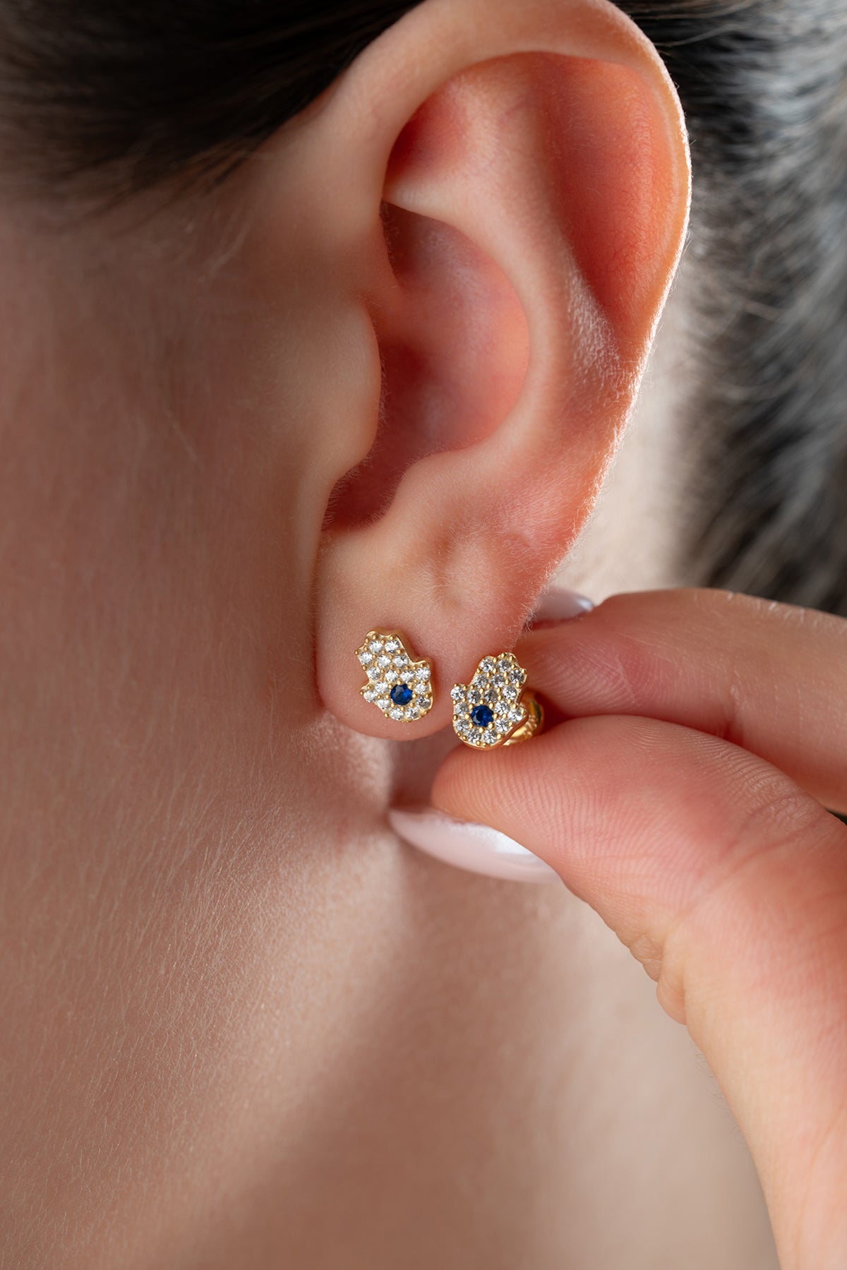 Boucles d'oreilles à la main de Fatima avec un œil