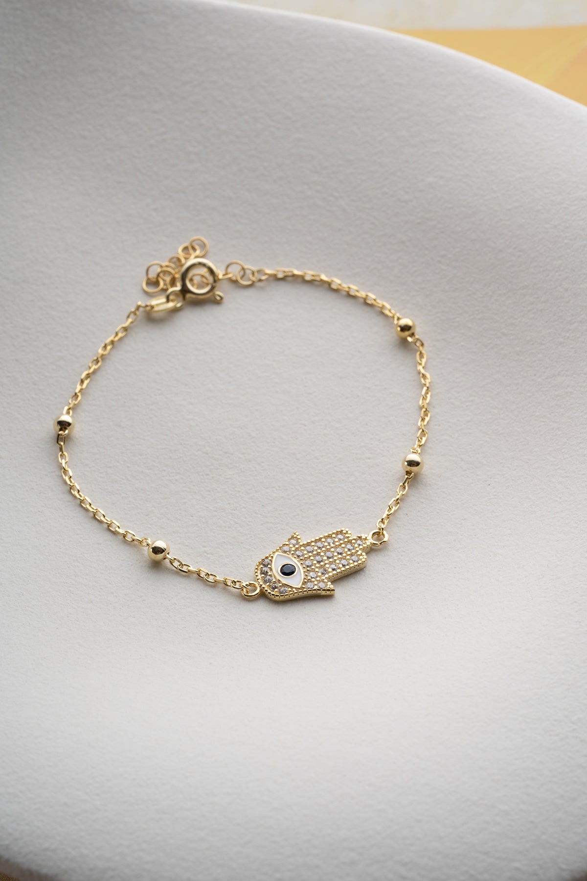 Bracelet plaqué or avec main de Fatima & Œil