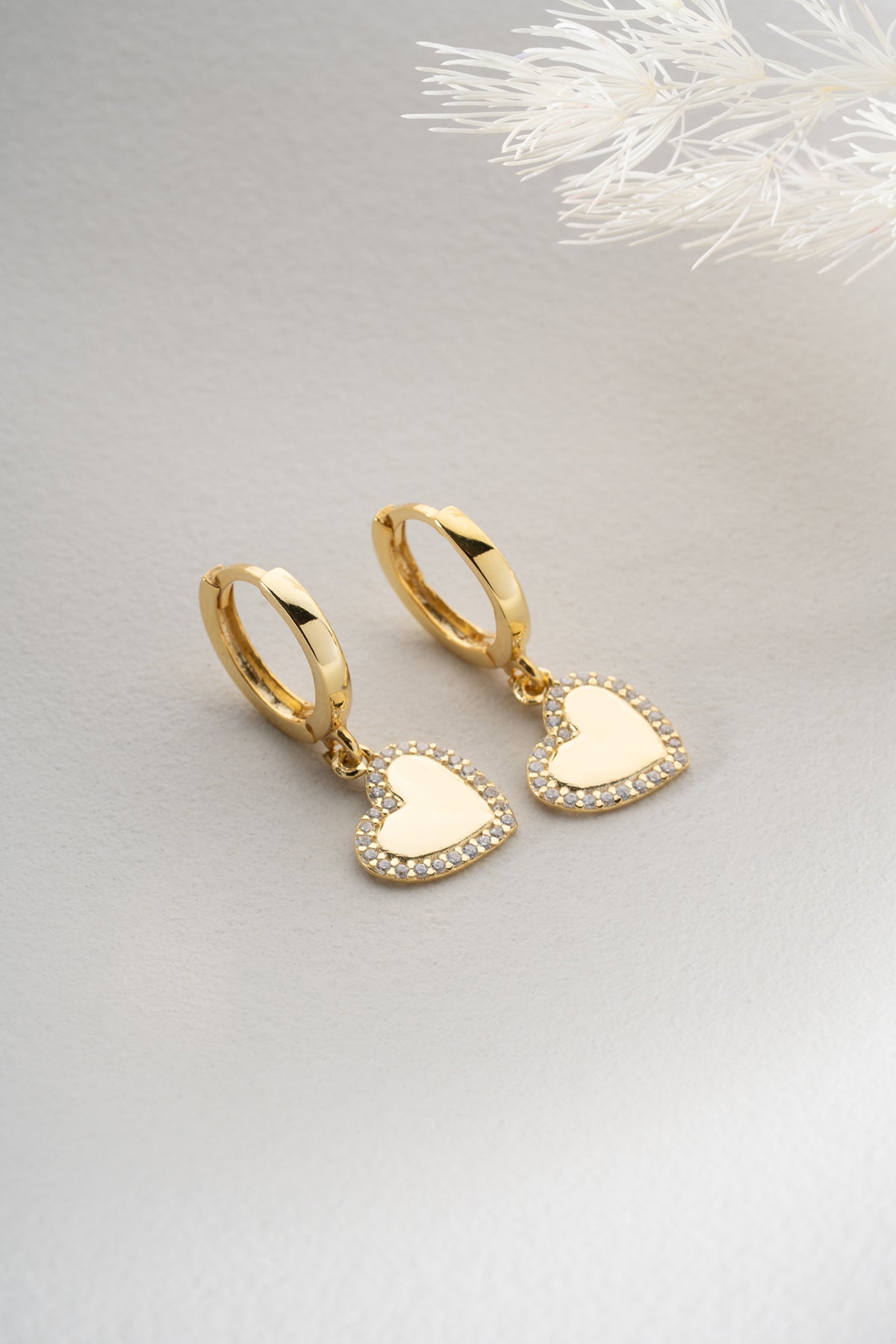 Boucles d'oreilles en forme de coeur avec pierres
